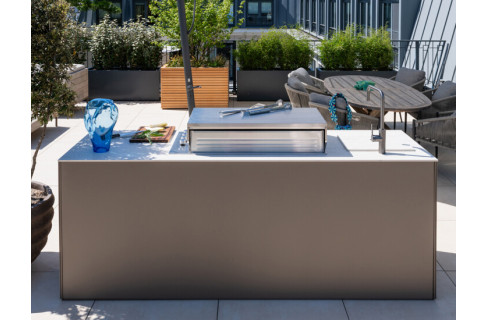 Outdoor kitchen with gas barbecue on rooftop terrace